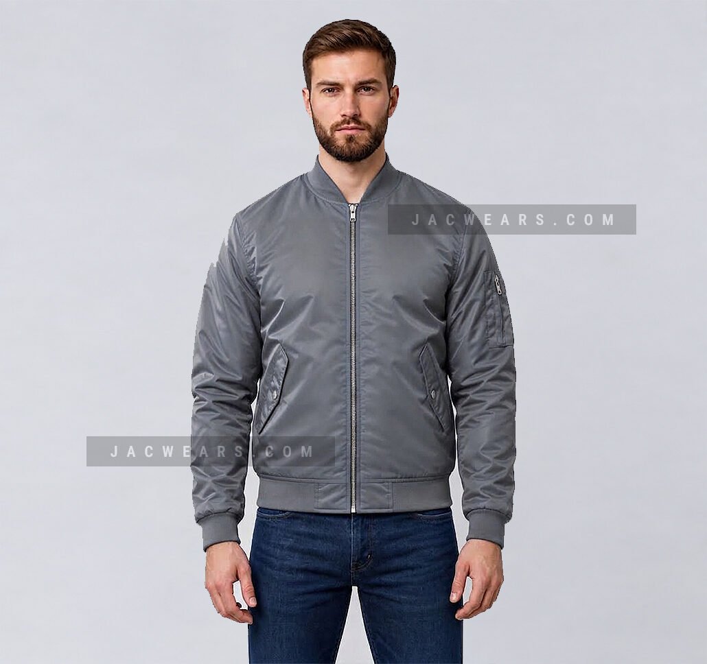 Custom grey nylon bomber jacket with utility sleeve pocket, front detail view