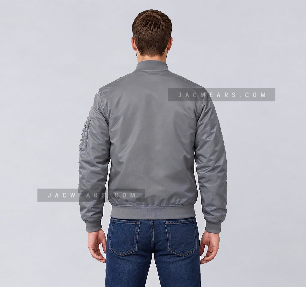 Custom grey nylon bomber jacket with utility sleeve pocket, back view