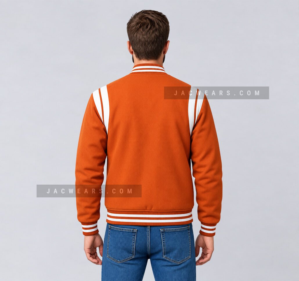 Custom orange wool letterman jacket with white shoulder inserts, back view