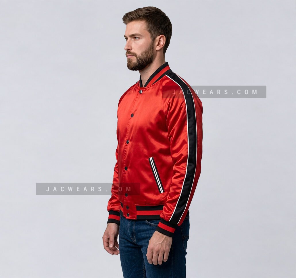 Custom red satin varsity jacket with black side stripes, angled view